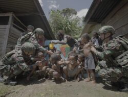 Satgas Yonif 715/Motuliato Bangun Bak Penampungan Air Bersih untuk Warga Papua
