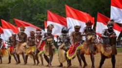 Generasi Muda Dogiyai Siap Kibarkan Merah Putih, Serukan “NKRI Harga Mati”